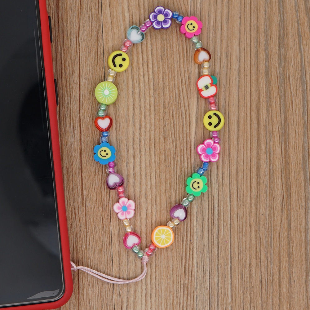 Bijou de téléphone universel / Pendentif bracelet à charms - Fleurs et emojis perles