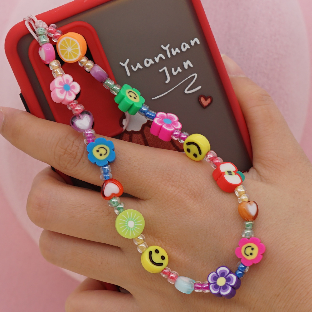 Bijou de téléphone universel / Pendentif bracelet à charms - Fleurs et emojis perles