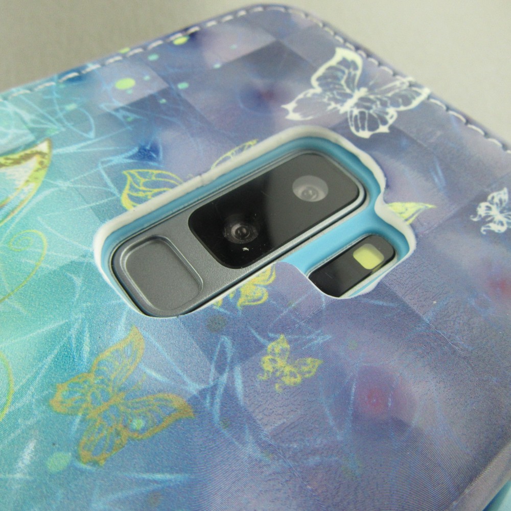 Fourre Samsung Galaxy S10e - Flip 3D papillons dorés