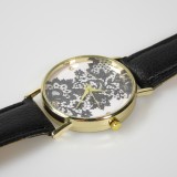 Montre fleurs oriental avec strass - Noir