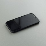 Coque iPhone X / Xs - Silicone rigide noir Le truc globalement bats les couilles